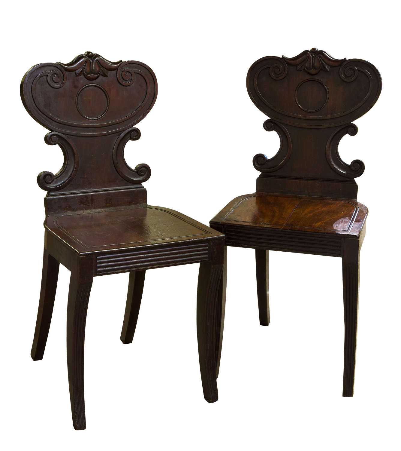 Pair of Regency mahogany hall chairs c1810
