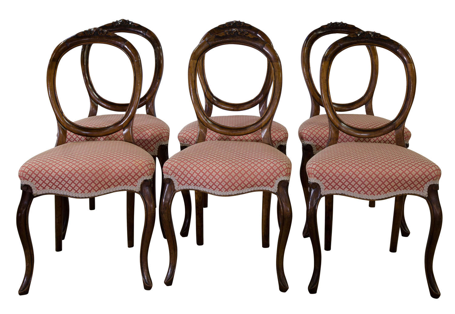 A set of 6 Victorian walnut balloon back dining chairs