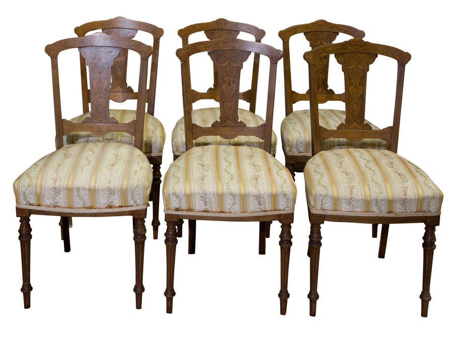 A set of six Rosewood splat back dining chairs