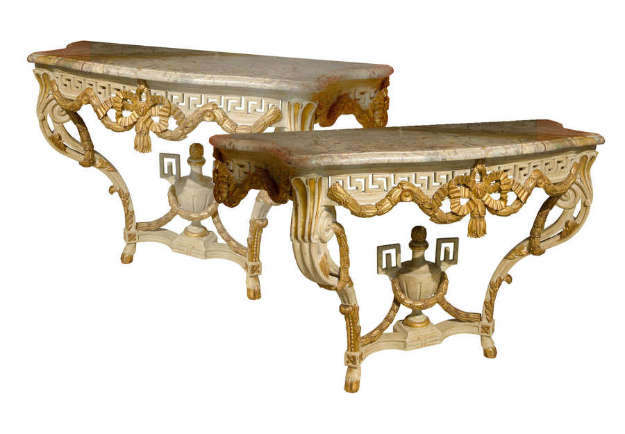 A pair of 20th Century Italian carved console tables