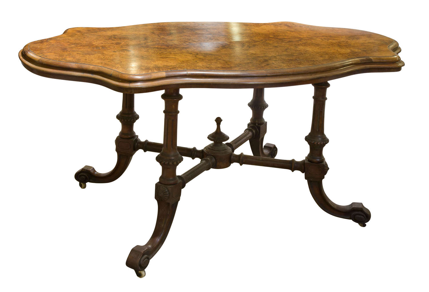 A fine Burr & Figured walnut serpentine shaped centre table