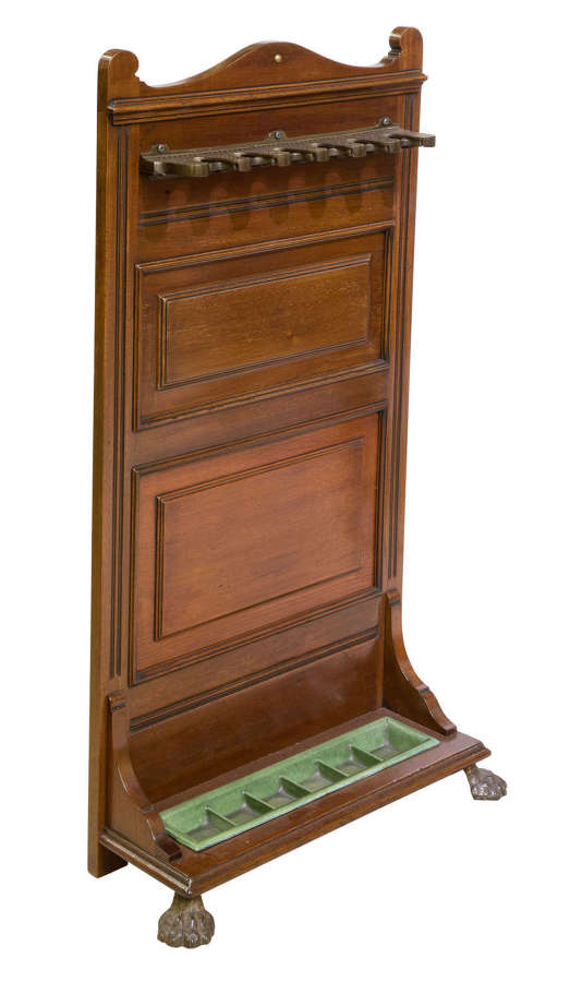 A mahogany mechanical snooker cue stick stand