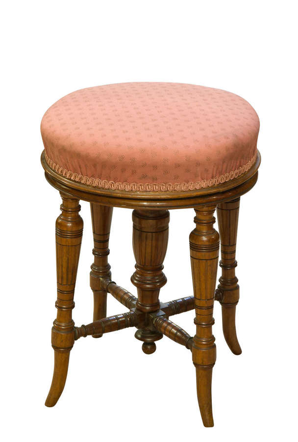 Victorian period walnut swivel top piano stool