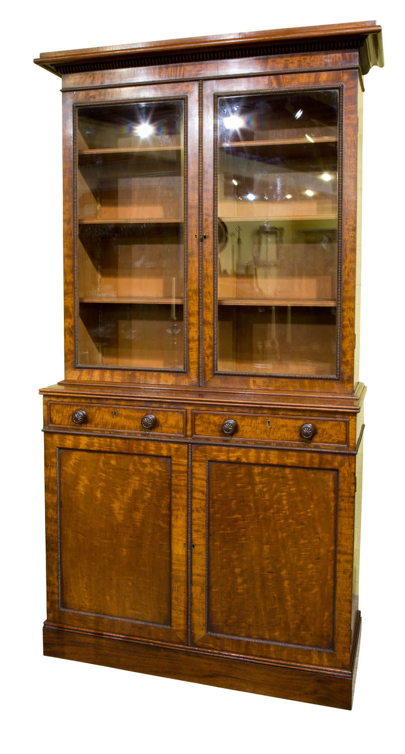 A very fine Regency figured mahogany 2 part bookcase
