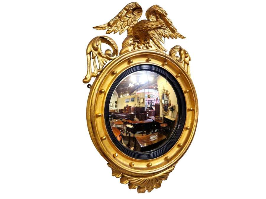 A Fine Regency Giltwood Convex Mirror