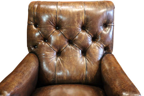 A Leather Armchair by Shoolbred