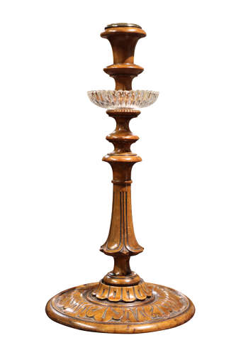 A Pair of Carved Walnut Candlesticks
