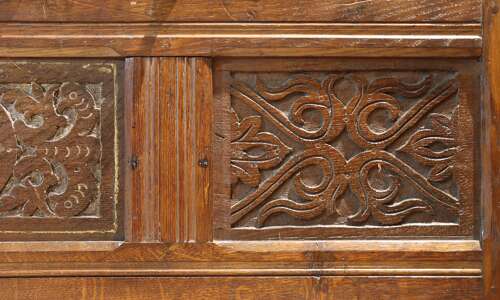 A 17th Century Style Oak Panelled Crib, circa mid-19th century